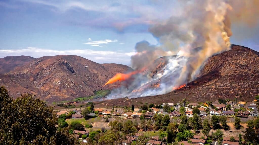 Wildfire in mountains near homes