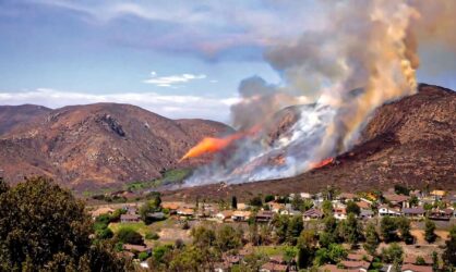 Wildfire in mountains near homes